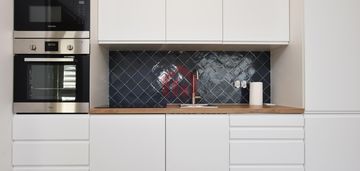 Salon z aneksem + 2 sypialnie, capital towers