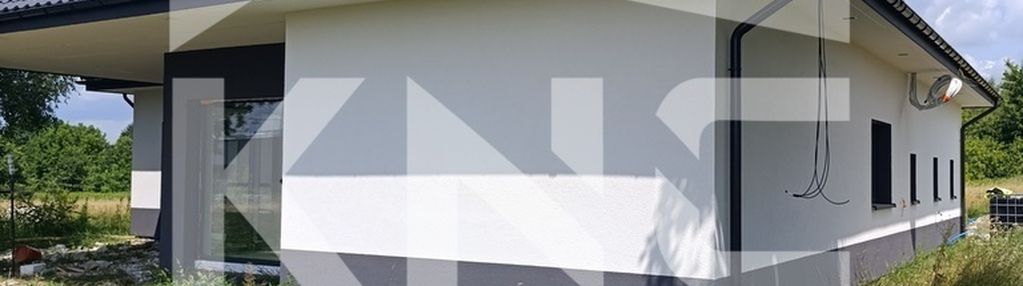 Nowy dom parterowy z antresolą.