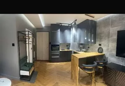 Apartament z miejscem w hali garażowej +komórka