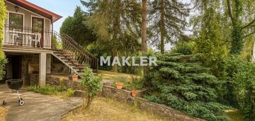 Działka obok jeziora z domkiem letniskowym z kw