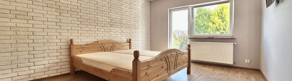 Dom parterowy z garażem i dużym trasem