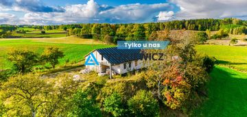 Działka z rozpoczętą budową domu w ciemnie