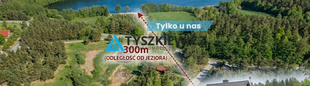 Urokliwy dom, otoczony drzewami, nad j.kamieniczno