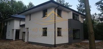 Nowe domy w otoczeniu zieleni –grodzisk mazowiecki